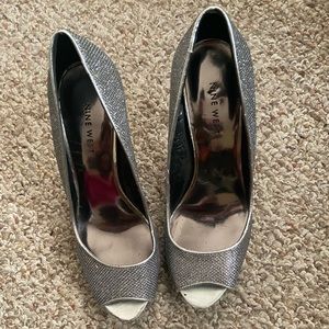 Sparkly silver Nine West shoes that were only wore one time.